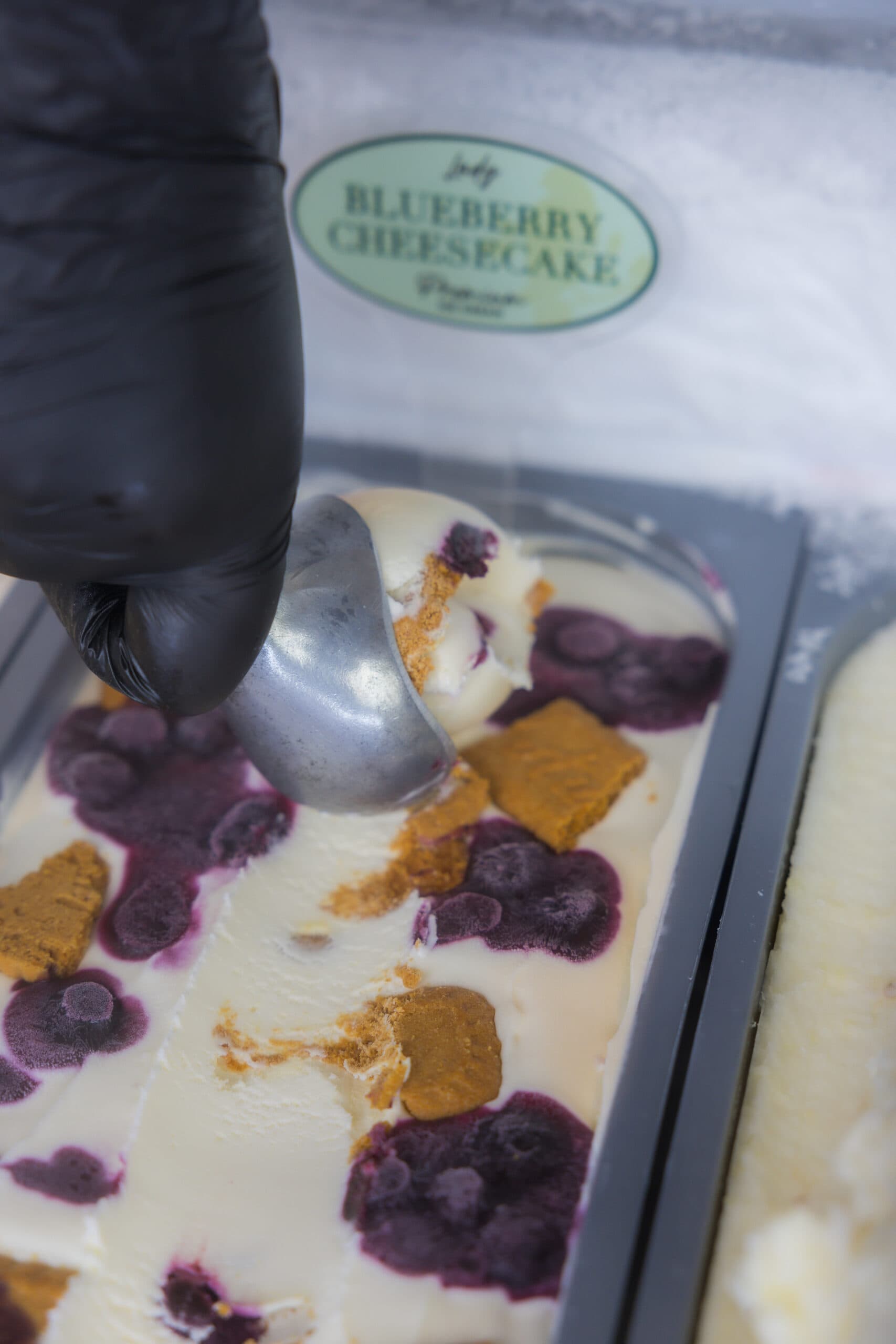Freshly scooped blueberry cheesecake ice cream