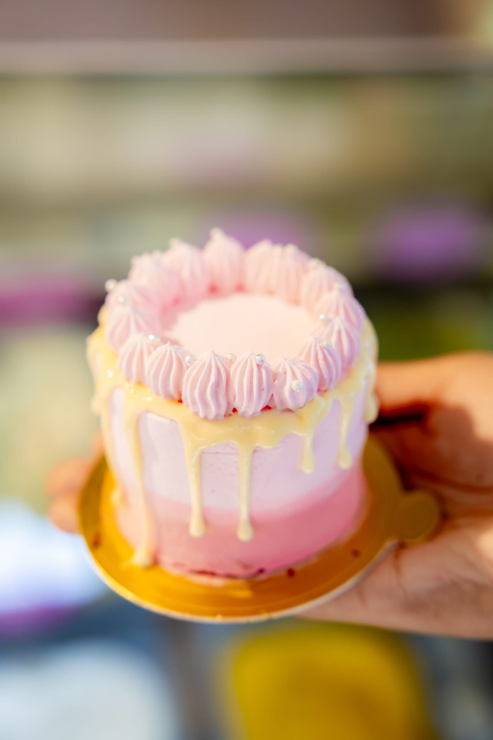 Pink and yellow Lady Coco celebration cake
